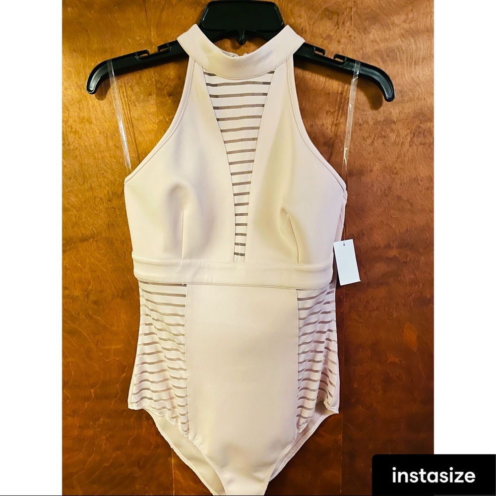 Blush body suit (with tags)